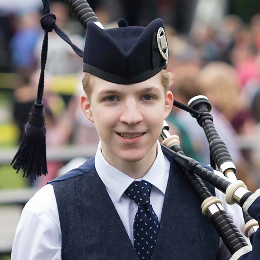 31126067_web1_221201-ABB-Champion-bagpiper_2