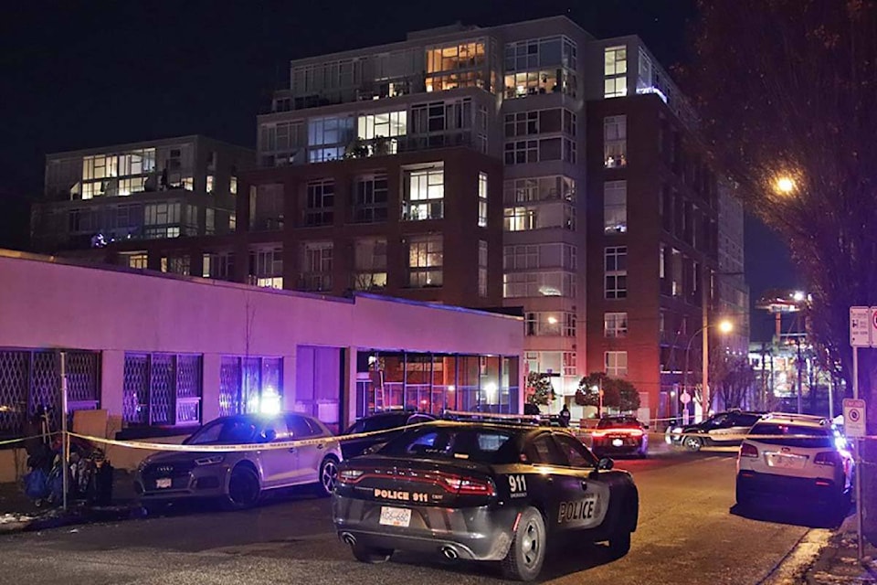 Vancouver police officers used less-lethal rounds to arrest a man near Main and Alexander streets Dec. 4, after he allegedly began shooting a gun inside his apartment building. (Credit: Shane MacKichan/ Special to Black Press Media)