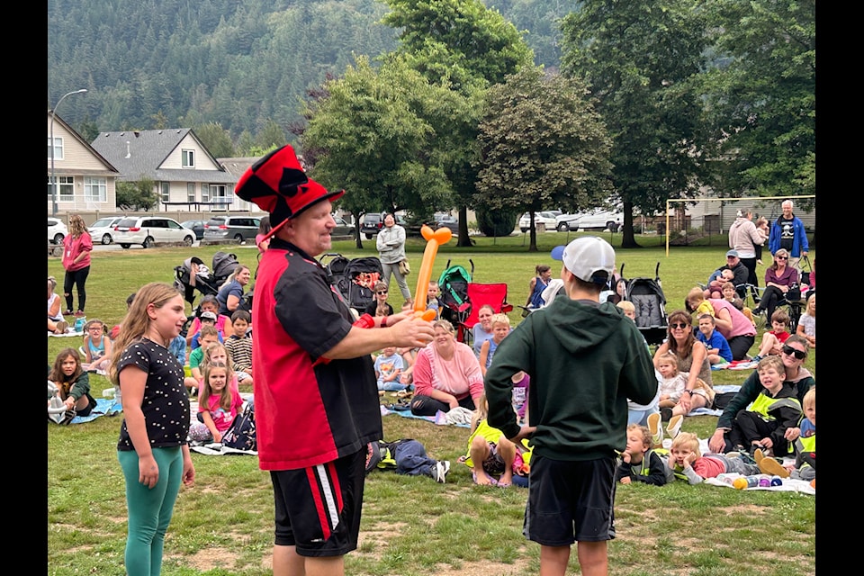 Norden the Magician performs for the crowd at Harrison Hot Springs Elementary during the final Storytime in the Park this year. 