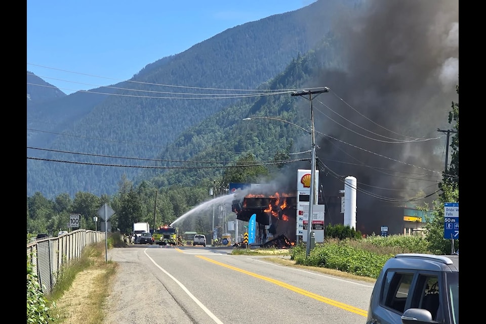 Multiple fire departments are battling a huge fire at the Rosedale Shell station on Saturday(June 7) afternoon.