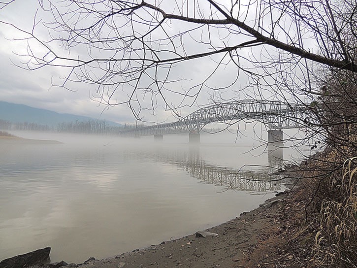 Mist rises off the Fraser River in the early morning of February 19.