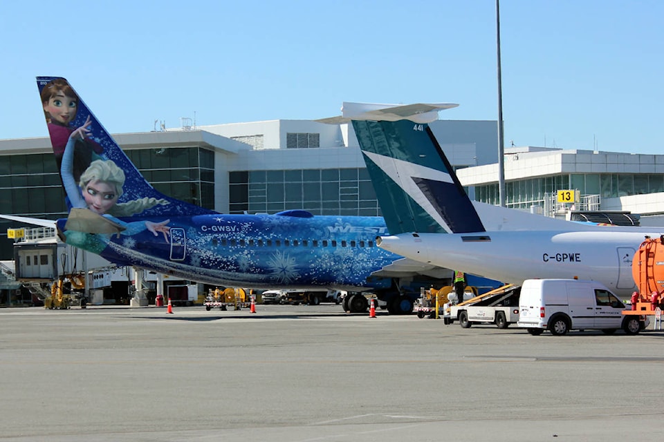 8699345_web1_WestJet_Frozen_Plane_YVR_1