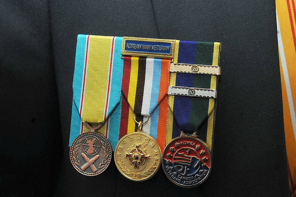 9317525_web1_171115-LAT-koreanwarmedals3