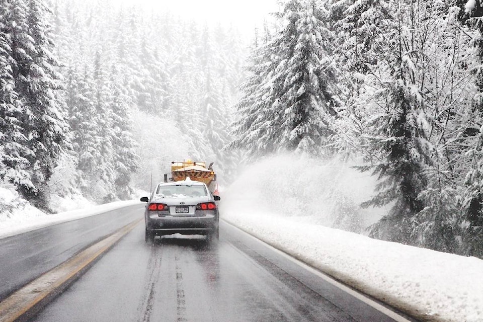 10145570_web1_171221-CCI-M-plow-sprays-snow-on-hwy-18.c.lb