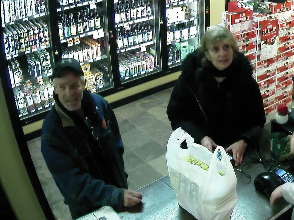 14654882_web1_liquor-store-couple_2