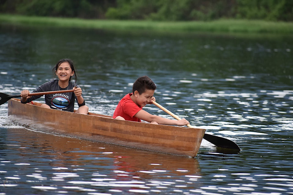 Canoers head to the starting line for the junior buckskin double paddle during the Seabird Island Festival. (Grace Kennedy/The Observer)