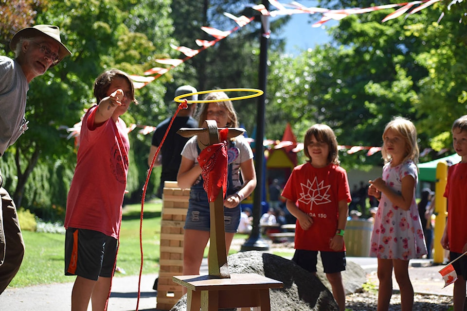 The Rootin’ Tootin’ Hometown Country Canada Day celebrations in Agassiz’s Pioneer Park saw kids of all ages try out some rustic games, including lassoing a wooden horse. (Grace Kennedy/The Observer)