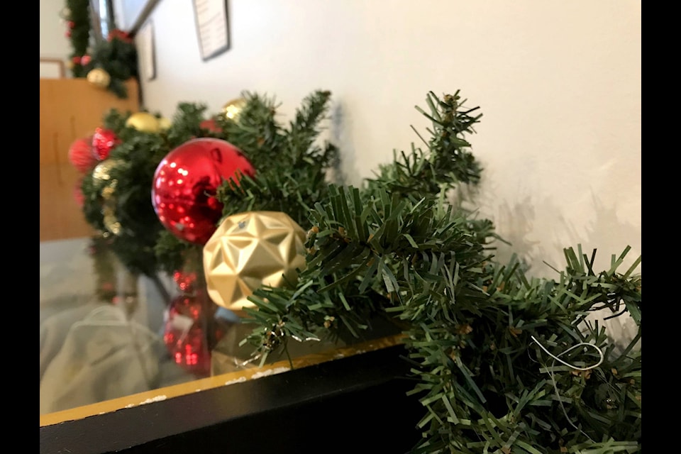 Garland sits on one of the display cases at the Agassiz Harrison Museum. The museum is open from 10 a.m. to 4 p.m. Wednesday through Saturday. (Adam Louis/Observer)