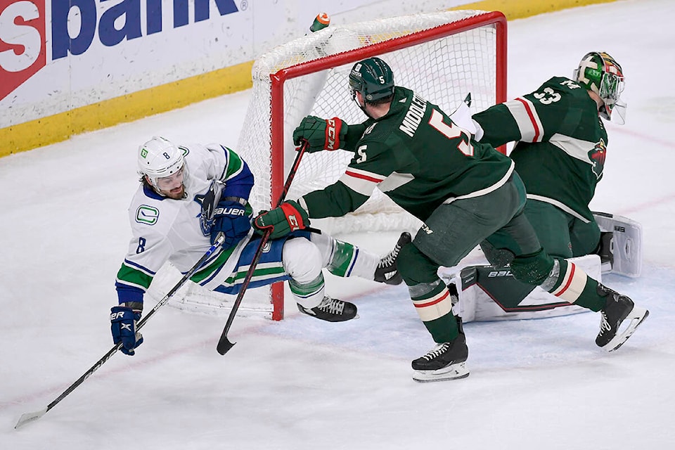 28882364_web1_220421-CPW-Canucks-Wild-wild_1