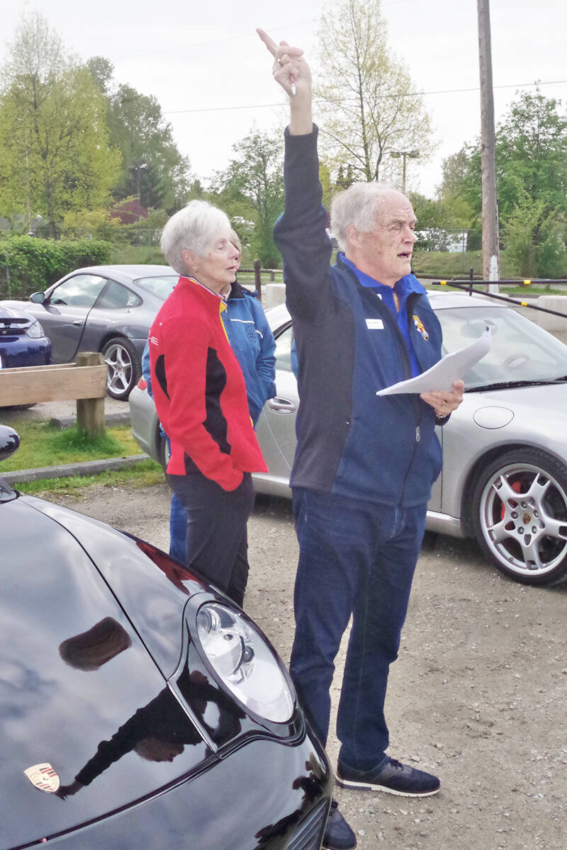 Cloverdale resident Gary Walker, with wife Lena, led 39 Porsches on a historic tour of the Fraser Valley on Sunday, May 1. (Graham MacDonell/Special to Langley Advance Times)