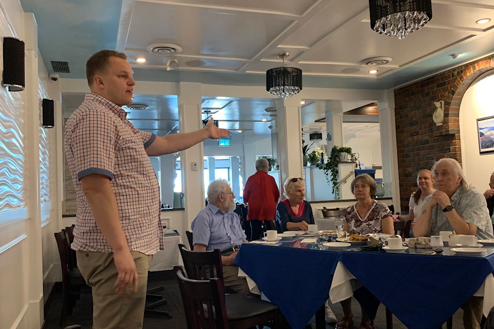 MP Brad Vis speaks at Milos Greek Taverna before a crowd of Harrison residents. Among other items of discussion, residents and Vis talked about the closure of the Harrison public pool. (Adam Louis/Observer)