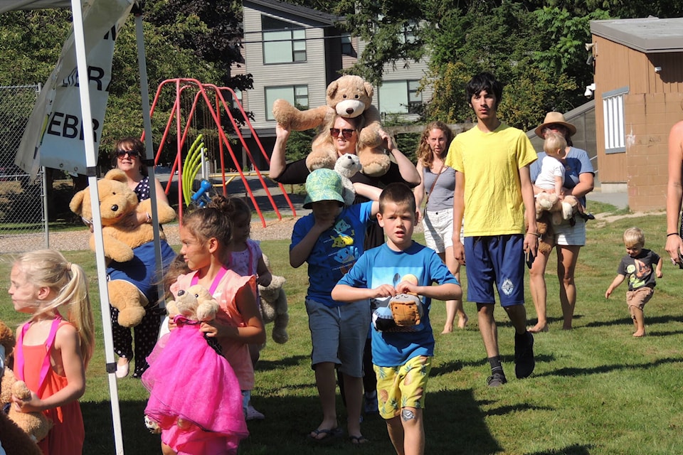 The Teddy Bear Parade marches through Harrison Hot Springs Elementary during the final Storytime in the Park for the year. (Adam Louis/Observer)