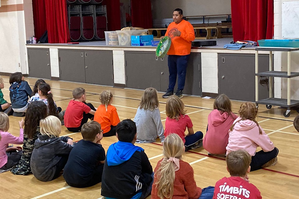 Shane John shares his knowledge of residential schools with students at Coquihalla Elementary in Hope. (Photo/Balan Moorthy)