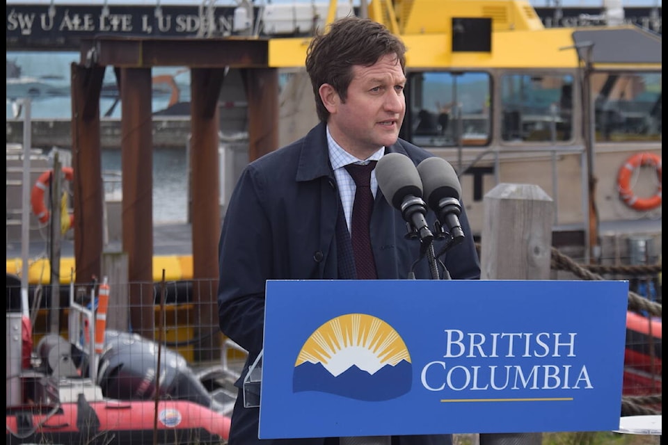 Minister of Transportation and Infrastructure Rob Fleming announces $9 million in funding to install shore power infrastructure at Ogden Point on Wednesday (April 5). (Brendan Mayer/News Staff)