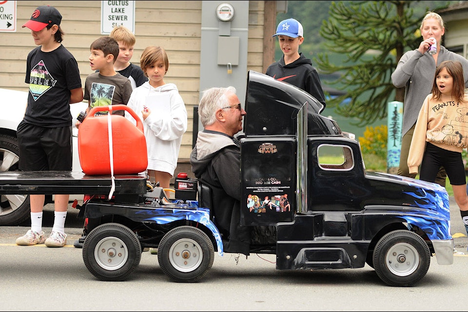 People take part in the parade during Cultus Lake Day on Saturday, June 24, 2023. (Jenna Hauck/ Chilliwack Progress)