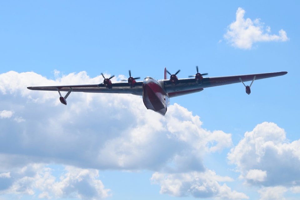 The Hawaii Mars flies over Sproat Lake one final time on Sunday, Aug. 11.