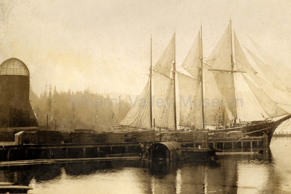 In this photo, circa 1922, the schooner "William Taylor of New York" with all sails up, can be seen tied to the wharf at Alberni Pacific Lumber. A conical burner can be seen at the left hand side and the dock is loaded with lumber. To view more than 24,000 historical Port Alberni photos, visit the Alberni Valley Museum’s online photo archives at portalberni.pastperfectonline.com.