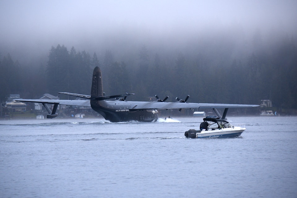 The Philippine Mars taxis along Sproat Lake on the way to Taylor Arm on Sunday, Dec. 15, 2024 where it finally took off to head south to its final destination. The waterbomber made it as far as Pat Bay off of Victoria, where it landed with No. 4 engine problems. 
