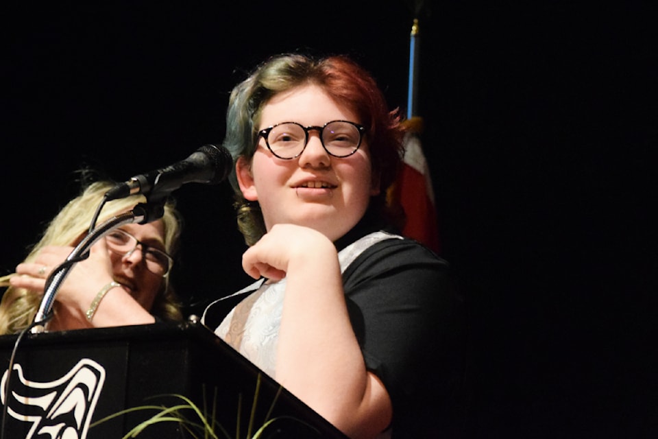Graduate Alastair Dooyeweerd speaks to the crowd at the Eighth Avenue Learning Centre graduation ceremony on June 20, 2024. 