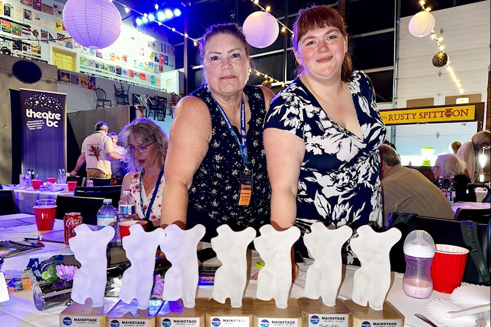 Producer Liane Fitzpatrick and director Nicole Foster pose for a photo with their awards from Mainstage.