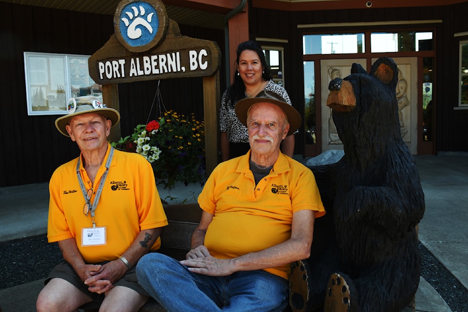 Ian Staton and Gerald Labute, front, with Alberni Valley Chamber of Commerce CEO Jolleen Dick, prepare for a volunteer shift as tourism ambassadors at Cathedral Grove on Friday, July 19, 2024. 