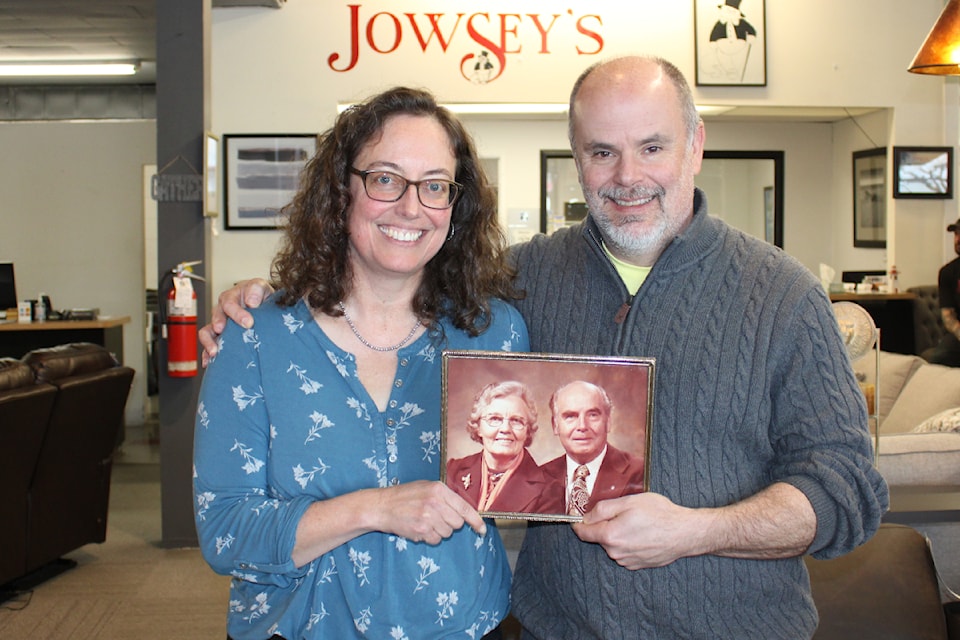 Jennifer and Mark Norn share a photo of Norn's grandparents, Aili and Jack Jowsey, who opened Jowsey's furniture store 77 years ago.