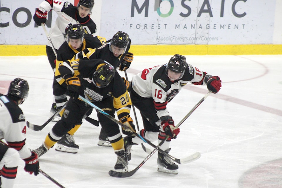 Alberni Valley Bulldogs' Jesse Allecia, right, blocks Coquitlam Express winger Trip Pendy from the puck late in the third period of their B.C. Hockey League game on Oct. 26, 2024. The Bulldogs beat the Express 4-1, a fitting end to Hockey Day in PA. 