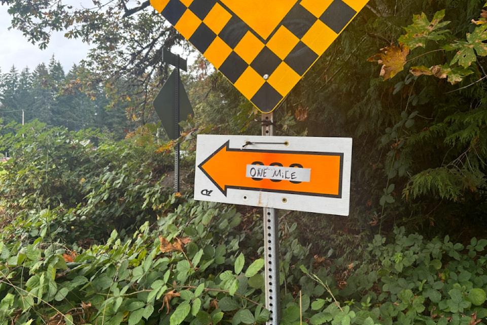 A sign points crew members towards the filming of "One Mile" in Port Alberni.