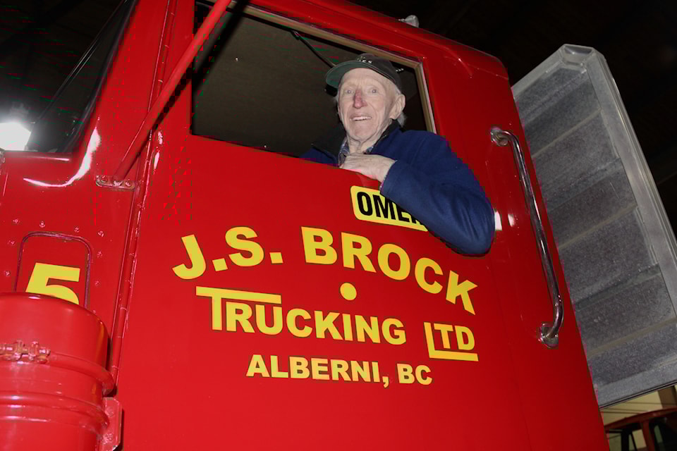 Omer Pelletier, 87, with the truck that he drove and also totally refurbished. 
