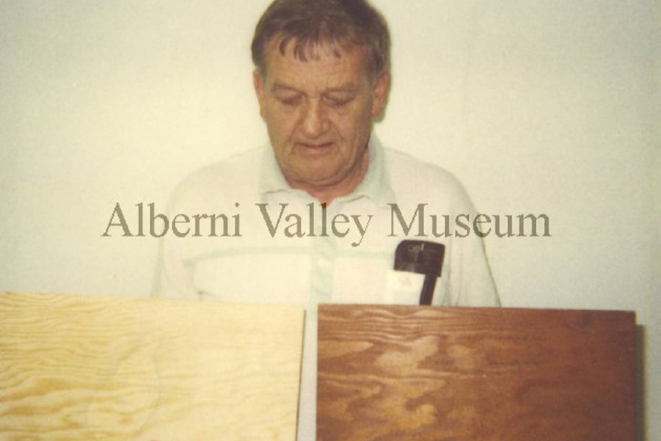 In this photo, taken in the early 1990s, Ray Morris looks down at the first and last panels of plywood produced at Alberni Plywood. The plywood plant was opened in 1942 and closed in 1991. To view more than 24,000 historical Port Alberni photos, visit the Alberni Valley Museum’s online photo archives at portalberni.pastperfectonline.com.