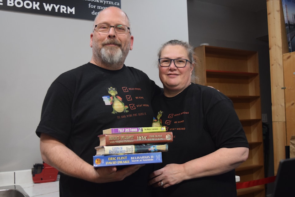 Brian and Jeannie Webber, the owners of Fireside Books, celebrate the opening of The Book Wyrm in Port Alberni.