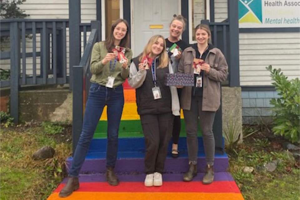 Canadian Mental Health Association staff happily accept a $4,000 donation from the Port Alberni Funtastic Sports Society in December 2024. Funds were raised by Funtastic volunteers. 