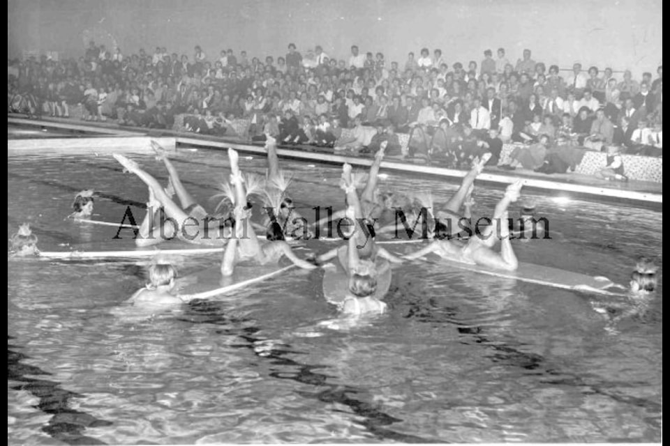 This photo, taken sometime between 1967 and 1975, shows a synchronized swimming performance at Echo Pool.  To view more than 24,000 historical Port Alberni photos, visit the Alberni Valley Museum’s online photo archives at portalberni.pastperfectonline.com.