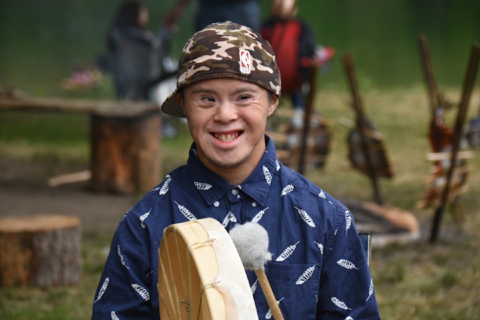 Joshua Watts drums during Indigenous Peoples Day celebrations at Paper Mill Dam on June 21, 2025. (SUSIE QUINN/ Alberni Valley News)