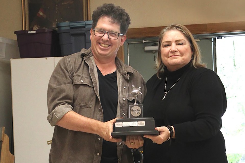 Adjudicator Leon Potter presents producer Liane Fitzpatrick with the award for Best Production at the North Island Zone Drama Festival on May 18, 2025. (SUBMITTED PHOTO/ Alberni Valley News)