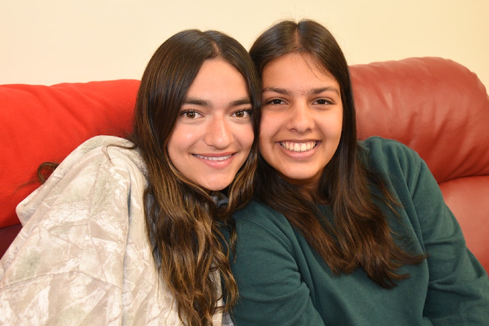 Jenelle Kozlowski, left, and Kate Basra, co-MCs at the Alberni District Secondary School graduation ceremonies June 26-27, 2025, will finish their school years the same way they began: as best friends. (SUSIE QUINN/ Alberni Valley News)