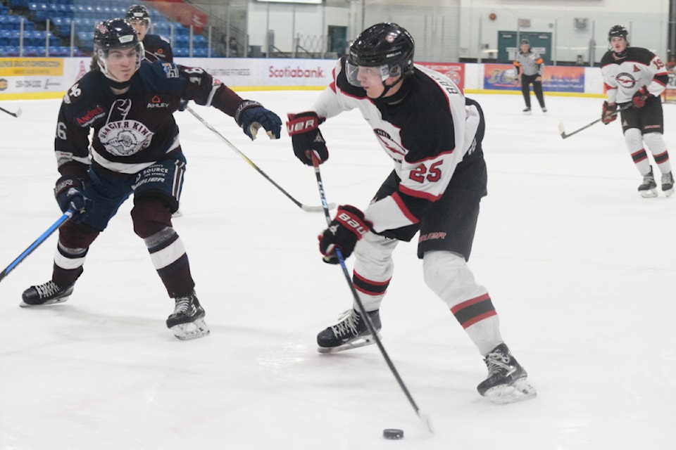 Port Alberni Bombers forward Jack Barrett takes a shot at the Comox Valley Glacier Kings goal.