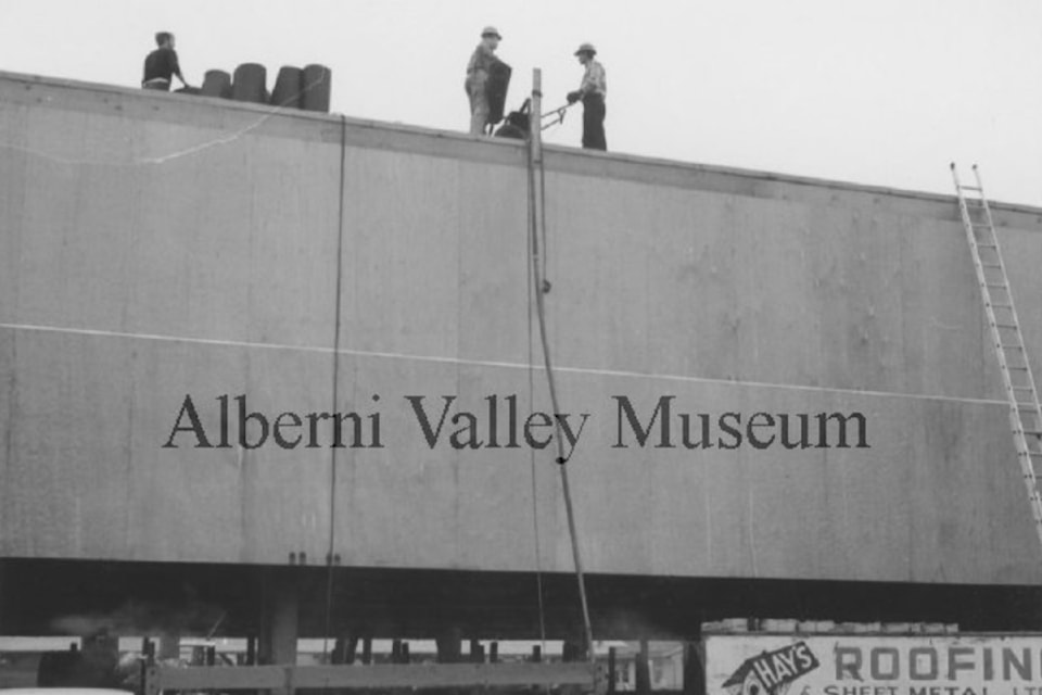 This photo, circa 1969, shows Hays Roofing putting a roof on a new building covering the lumber sorter at Somass Division Mill. To view more than 24,000 historical Port Alberni photos, visit the Alberni Valley Museum’s online photo archives at portalberni.pastperfectonline.com.