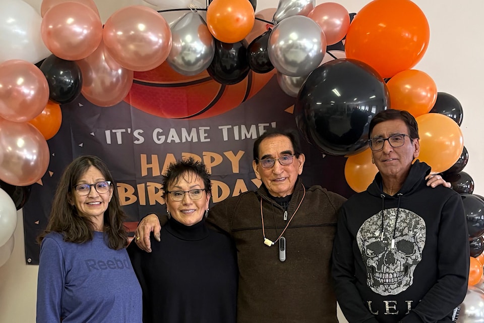 Tom Watts poses for a photo with three of his four children. From left to right are Annie, Cynthia, Tom and Wallace. Missing is Betty. 