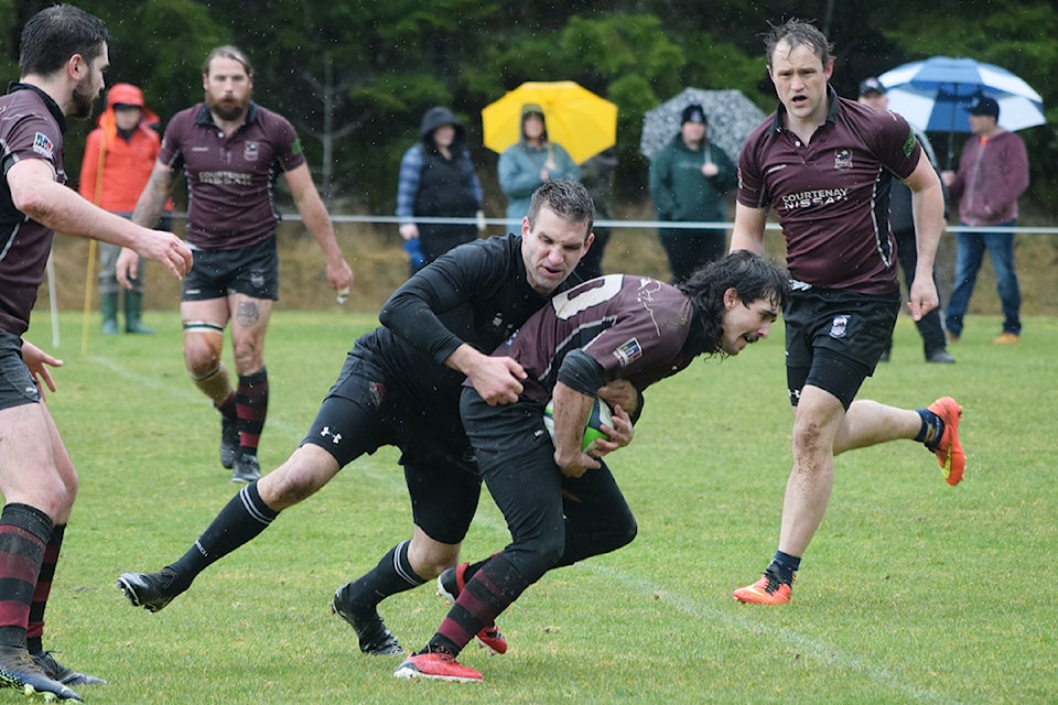 Brennan Tourangeau of the Port Alberni Black Sheep tackles a Comox player during a game on March 15, 2025.