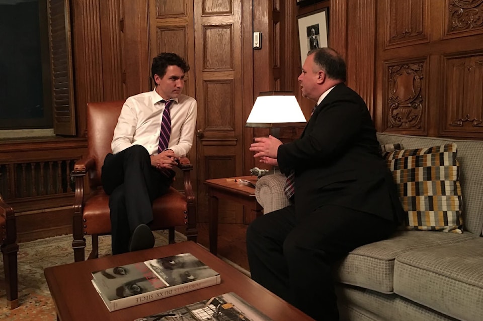 250319-avn-gord-johns-trudeau-19mar2025_9554