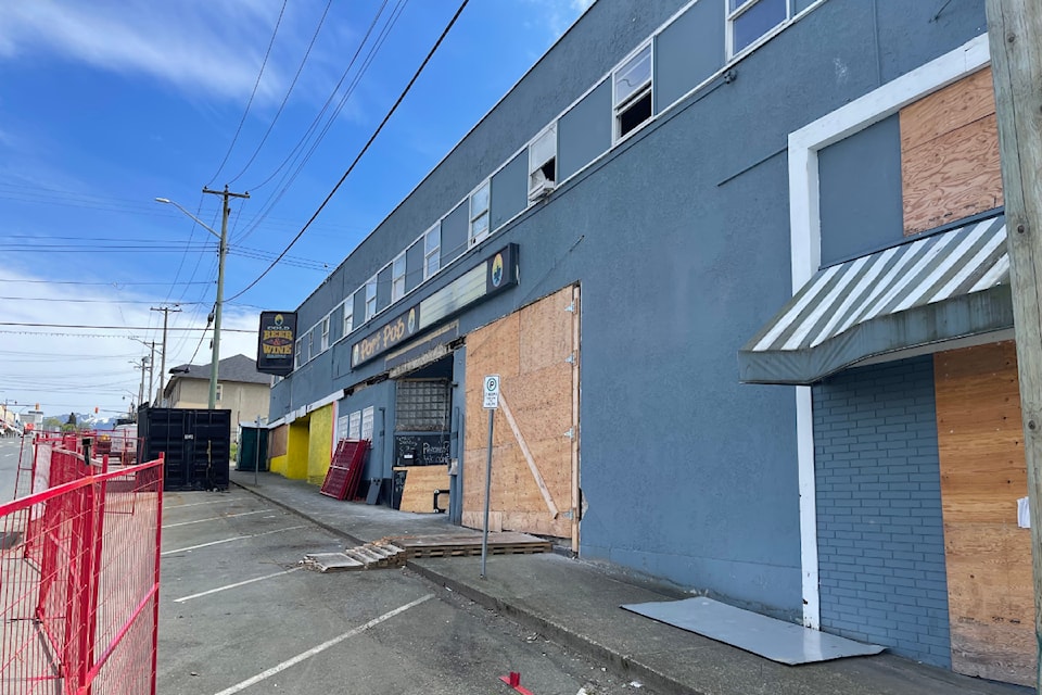 Work has begun again on the former Port Pub building. Crews are addressing asbestos removal and preparing the building for demolition, as of May 5, 2025. (SUSIE QUINN/ Alberni Valley News) 