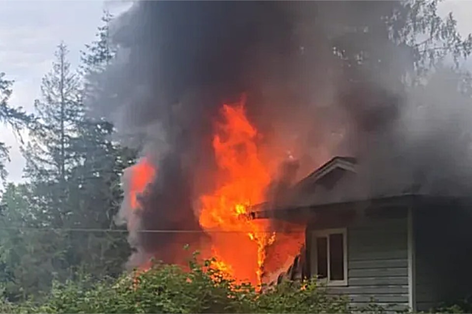 Fire burns through the home of Gloria Fred and Frank Pollard on Tseshaht First Nation reserve land on Wednesday, May 14, 2025. (SUBMITTED PHOTO/ Alberni Valley News)
