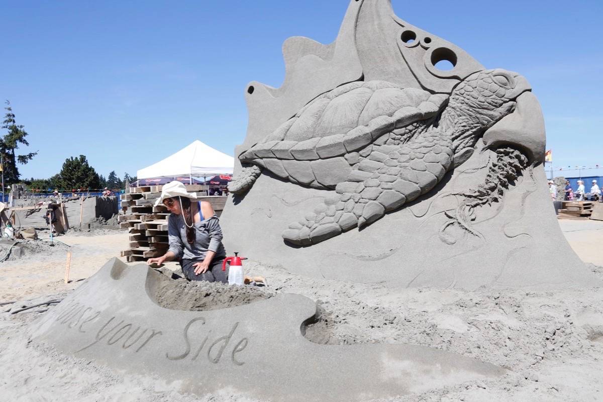 12764733_web1_180715-PQN-M-SandSculptingDAy3-ak4-180715