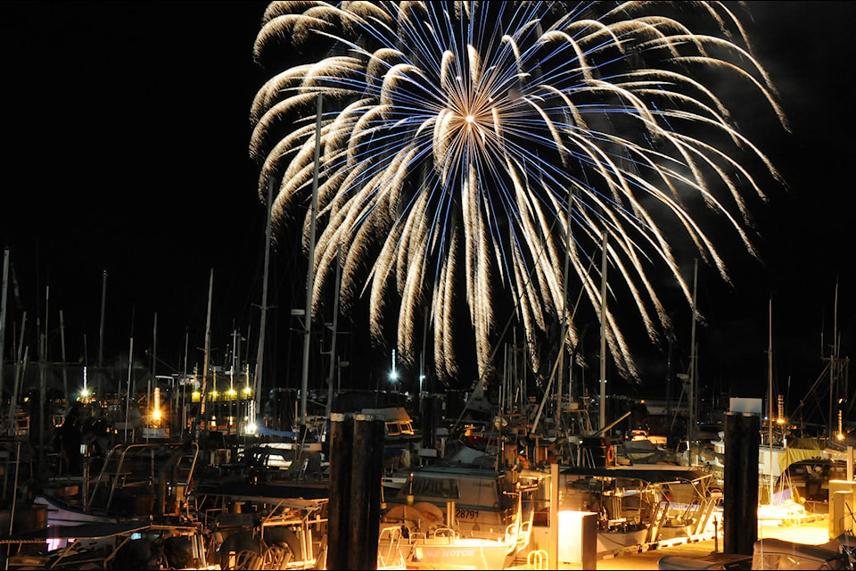 The Quality Foods fireworks display lights up Tyee Landing and boats moored at Fisherman’s Wharf on the first night of the 48th annual Port Alberni Salmon Festival. SUSAN QUINN PHOTO