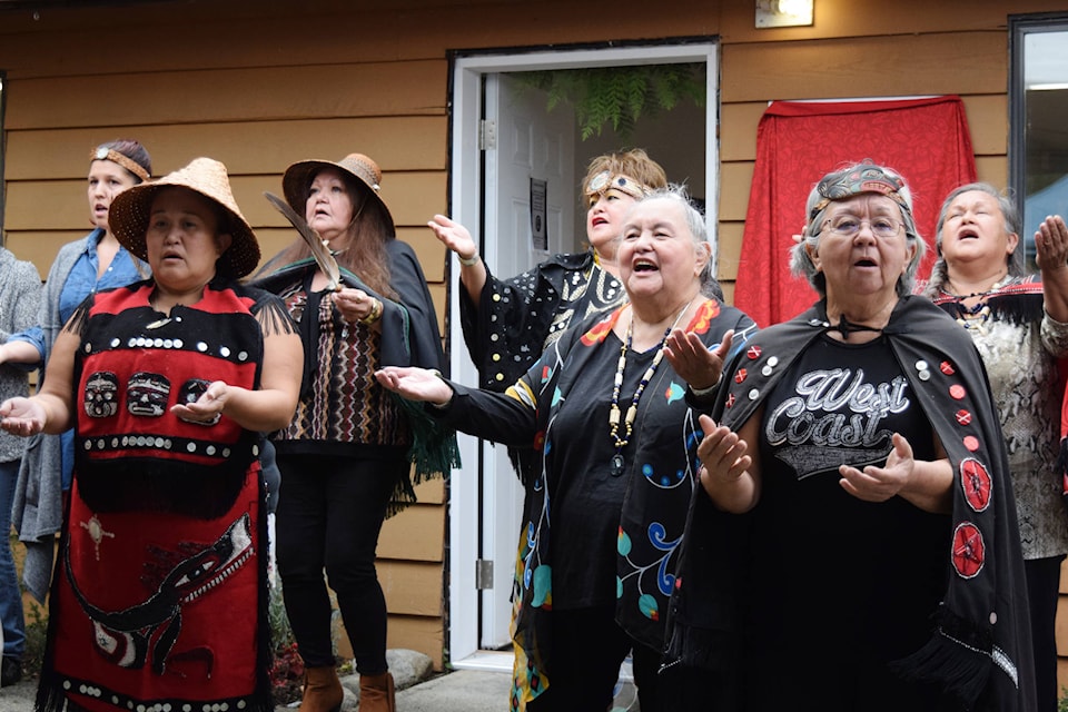 Members of the Robinson family sing before the unveiling of the new Tseshaht Language House on Saturday, Sept. 21. ELENA RARDON PHOTO