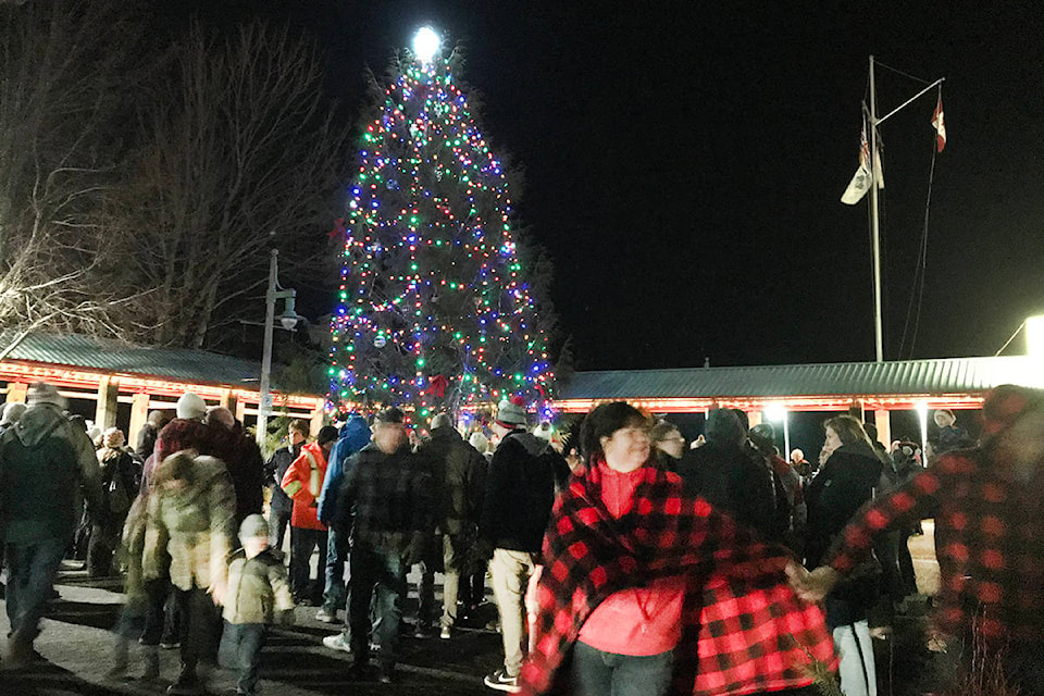A couple of hundred people gathered in the record-breaking cold on Friday night (Nov. 29, 2019) to watch the lighting of the Harbour Quay Christmas tree, enjoy entertainment from Timbre! and the ADSS high school band, grab a sweet treat, gab with Santa Claus and shop late during the annual Light-Up celebration. (SUSAN QUINN/ Alberni Valley News)