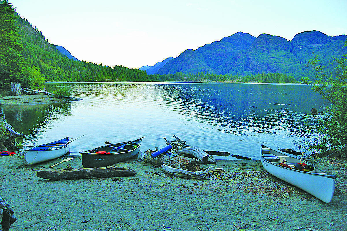 Canoes beached at Buttle Lake marine campground in Strathcona Provincial Park. Photo by Alistair Taylor/Campbell River Mirror