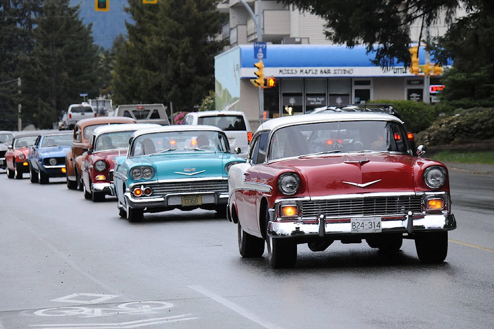 A line of classic cars cruises past Echo Village on 10th Avenue as part of the 150-strong Cruise for Care on Friday, April 24, 2020. The event was put on to salute health-care workers at Port Alberni’s long-term care facilities and its hospital. (SUSAN QUINN/ Alberni Valley News)