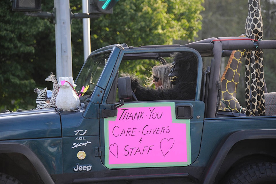 At least 250 cars, some of them decorated with signs, balloons and the odd gorilla, cruised through the streets of Port Alberni on Friday, May 29, 2020 for the second Cruise for Care honouring frontline workers. (SUSAN QUINN/ Alberni Valley News)